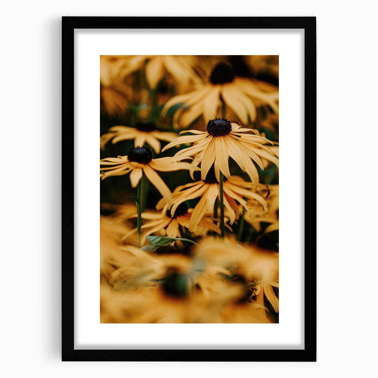 Abstract art print featuring vibrant spring colors on a textured canvas, framed in black, ideal for living room decor.