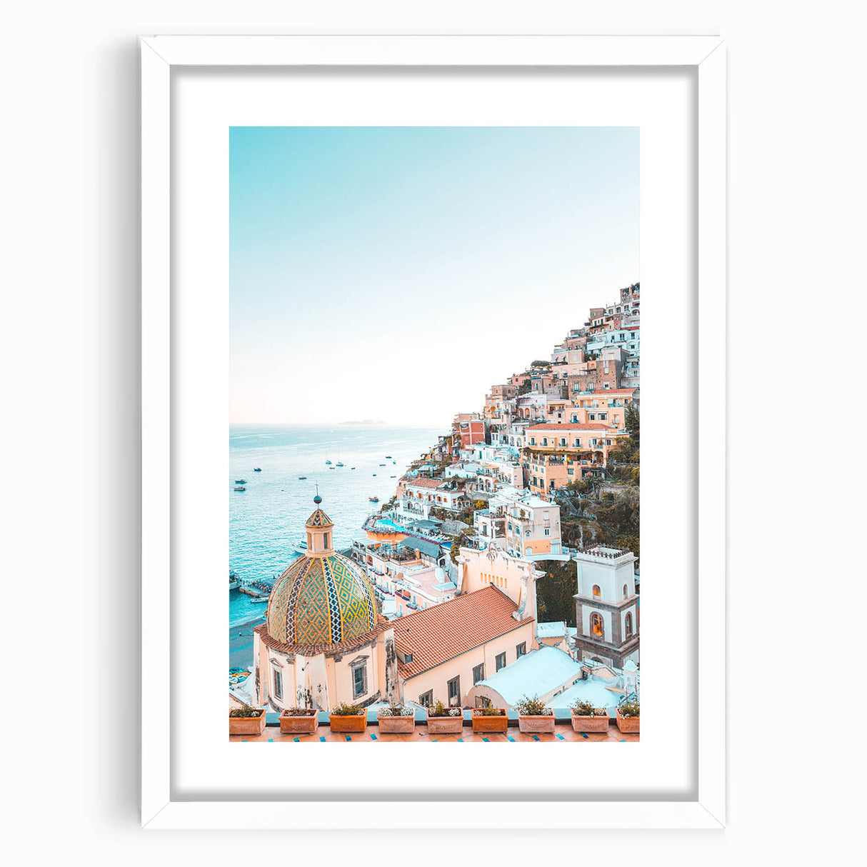 Abstract art print featuring swirling blue and green tones on a white framed canvas.