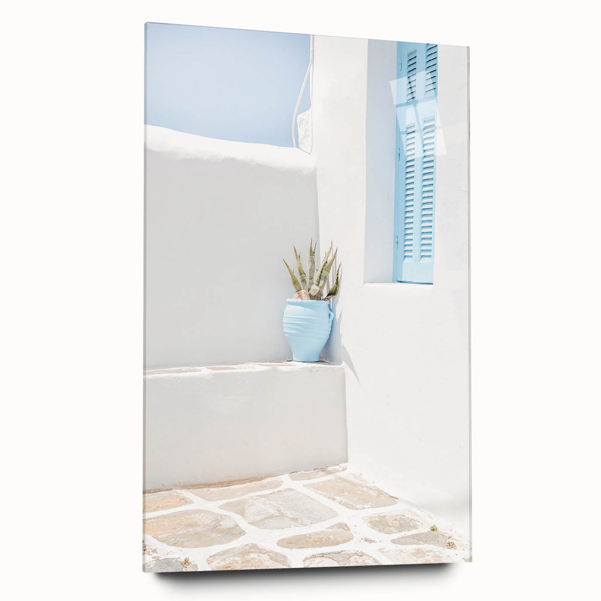 Large abstract wall art on acrylic glass featuring swirling blue and gray tones, ideal for bedroom or dining room decor.
