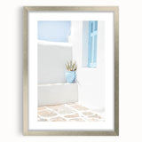 Textured abstract art print in silver frame featuring swirling gray and white patterns, ideal for modern bedroom ambiance.