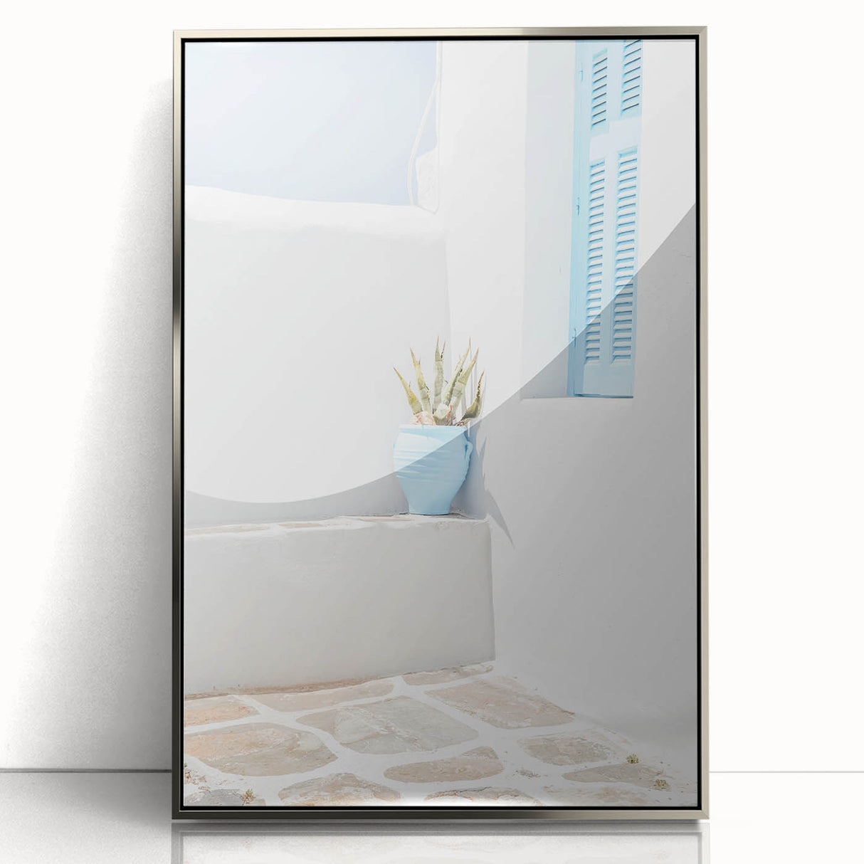 Mid-century modernist art depicting geometric shapes in muted pastel tones on a framed acrylic print.