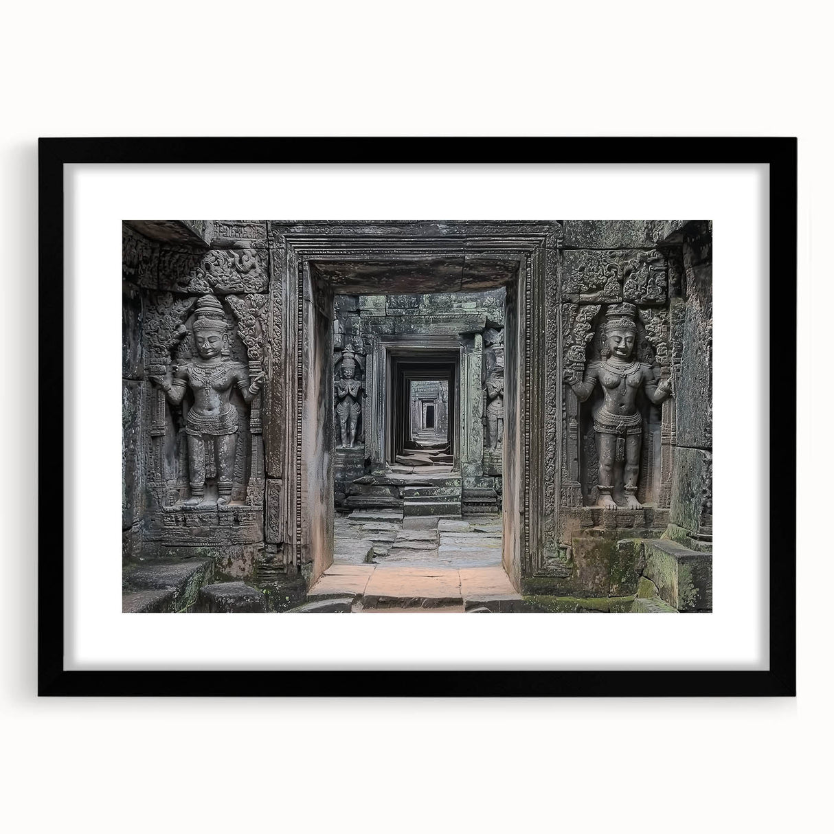 Black-framed landscape artwork featuring a serene castle scene with lush greenery and a blue sky, designed with a white mat for an elegant presentation.