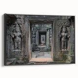 Framed canvas artwork depicting a scenic landscape with a majestic castle, featuring a black frame and vibrant colors, ideal for home decor.