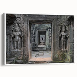 Framed canvas artwork depicting a picturesque landscape with a castle, showcasing vibrant colors and intricate details, set against a white background.