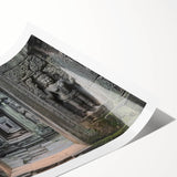 Rolled landscape print showcasing a majestic castle surrounded by lush greenery and a clear blue sky, perfect for home decor and art enthusiasts.