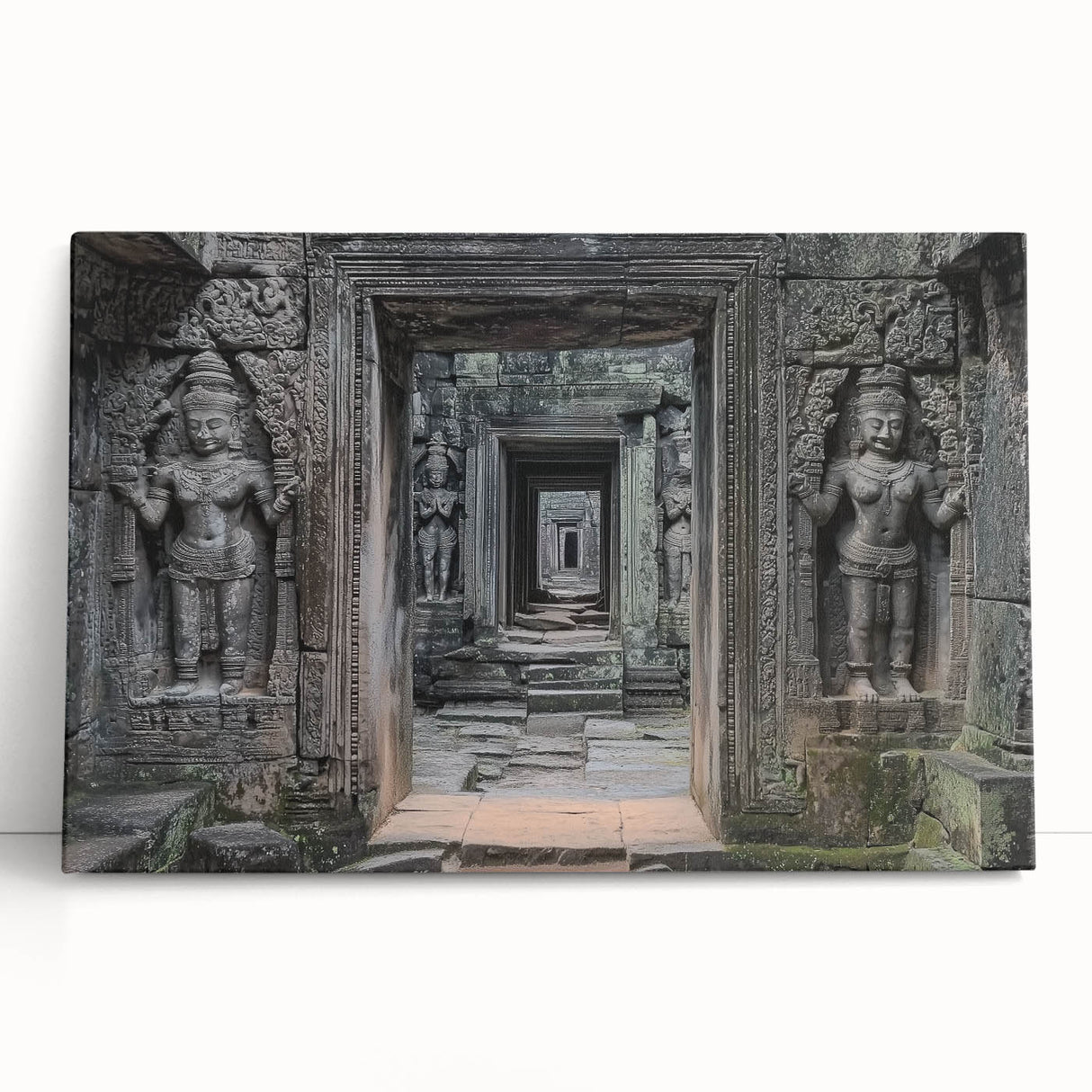 Stretched canvas artwork displaying a serene landscape featuring a majestic castle surrounded by lush greenery and a clear blue sky, ideal for home decor.
