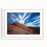 Framed landscape artwork displaying majestic cliffs with vibrant colors, set against a white mat background, perfect for home decor or gallery display.