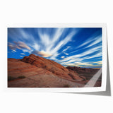 Vibrant rolled print showcasing a breathtaking landscape of cliffs against a serene sky, highlighting rich colors and intricate details, ideal for home decor.