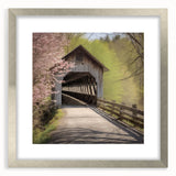 Textured abstract art print of a covered bridge in muted gray tones on a silver-framed matte canvas, ideal for bedroom decor.