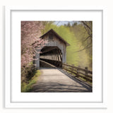 Abstract art print of a covered bridge, featuring muted gray and blue tones, framed with a white mat.