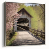 Framed canvas featuring a vintage-style landscape painting of a covered bridge in muted earth tones.