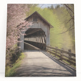 Black and white photo of a covered bridge on stretched canvas, ideal for kitchen wall art or bedroom ambiance.