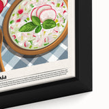 Close-up of extra large black wall art on framed canvas featuring textured, colorful food dishes.