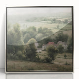 Framed acrylic wall art featuring a serene countryside landscape with lush greenery and a tranquil sky, presented in a sleek silver frame, ideal for home decor.