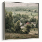 Framed canvas wall art showcasing a serene countryside landscape, featuring lush greenery and a tranquil sky, accented with a sleek silver frame for a modern touch. Perfect for home decor, this artwork adds a peaceful ambiance to any room.