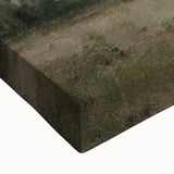 Close-up of a stretched canvas featuring a vibrant landscape scene with rolling hills and a serene countryside, showcasing rich greens and warm earth tones, perfect for home decor.