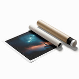 Rolled print of a serene countryside landscape showcasing rolling green hills under a bright blue sky, elegantly packaged in a protective cardboard tube for safe delivery.