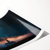 Rolled print showcasing a serene countryside landscape with lush green fields and a soft blue sky, elegantly packaged in a protective cardboard tube for safe delivery.