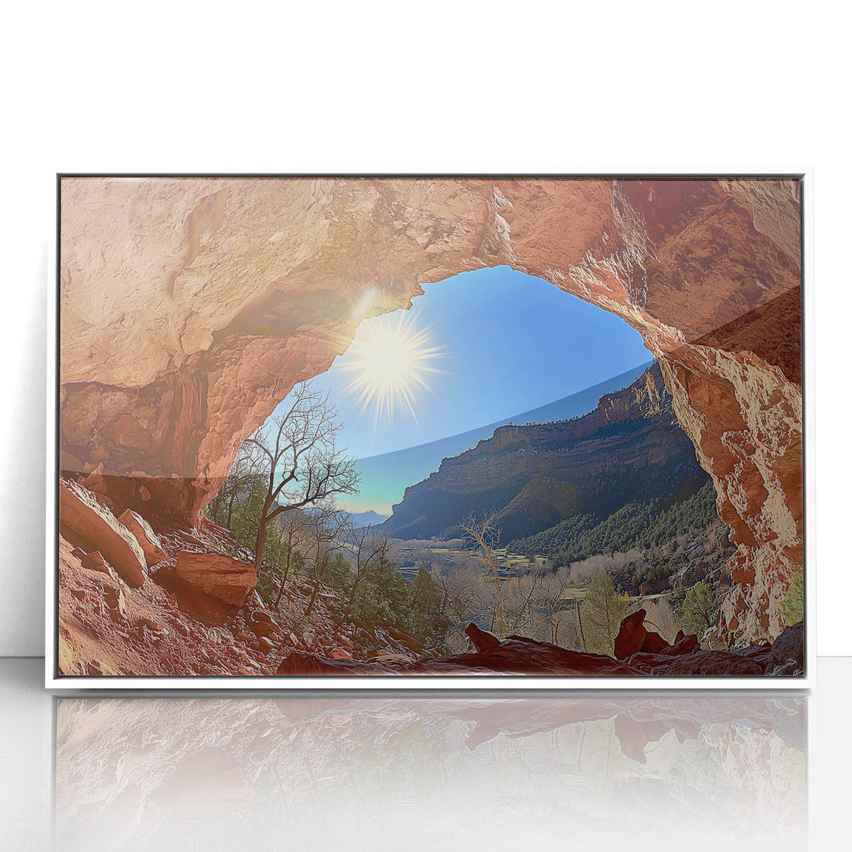 Framed acrylic artwork showcasing a vibrant desert landscape with striking warm colors, set in a sleek white frame, perfect for modern home decor.