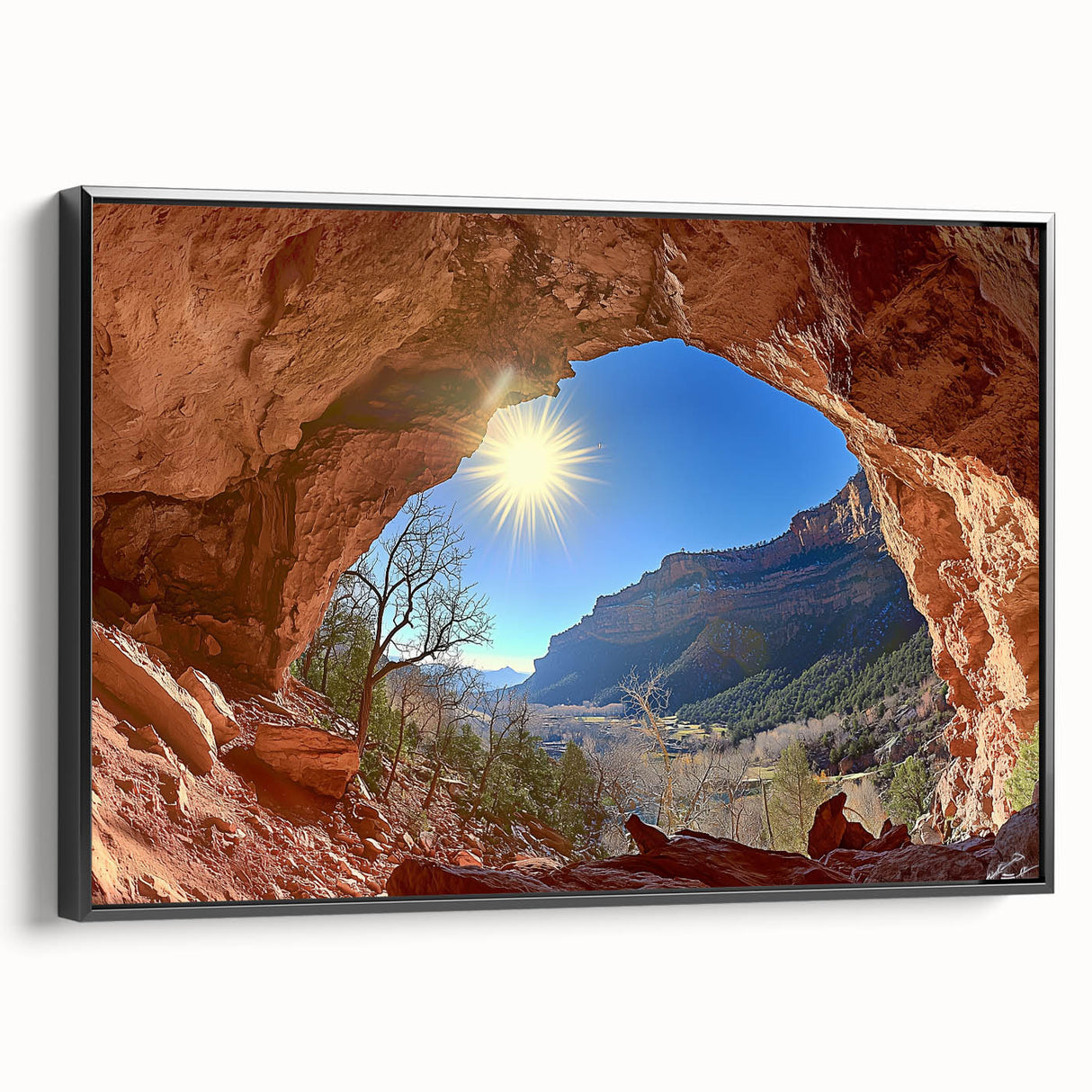 Framed canvas artwork depicting a stunning desert landscape, showcasing warm tones of orange and brown with a black frame, perfect for home decor.