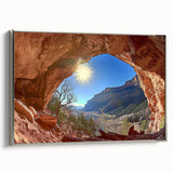 Framed canvas artwork depicting a serene desert landscape with warm tones of orange and yellow, featuring a sleek silver frame, perfect for modern home decor.