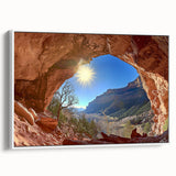 Framed canvas artwork depicting a vibrant desert landscape with warm tones of orange and yellow, showcasing rolling sand dunes under a blue sky, perfect for home decor.