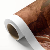 Desert landscape rolled canvas art showcasing vivid hues of orange and red under a dramatic twilight sky, ideal for home decor and artistic display.