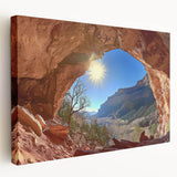 Desert landscape stretched canvas artwork showcasing vibrant hues of orange and red, highlighting the serene beauty of a sunset over sand dunes, perfect for home decor.