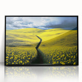 Framed acrylic artwork showcasing a serene landscape with lush green fields and a clear blue sky, designed to enhance home decor with a modern touch.