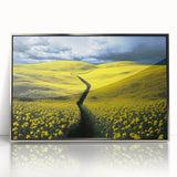 Framed acrylic artwork showcasing a vibrant landscape of lush green fields under a clear blue sky. The sleek silver frame enhances the modern aesthetic, making it ideal for contemporary home decor.
