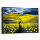 Framed canvas artwork showcasing a vibrant landscape of green fields under a clear blue sky, with a sleek black frame, ideal for modern home decor.