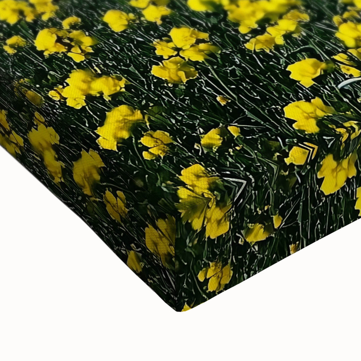 Close-up of a vibrant stretched canvas depicting a serene landscape with lush green fields under a bright blue sky, showcasing intricate texture and detail.