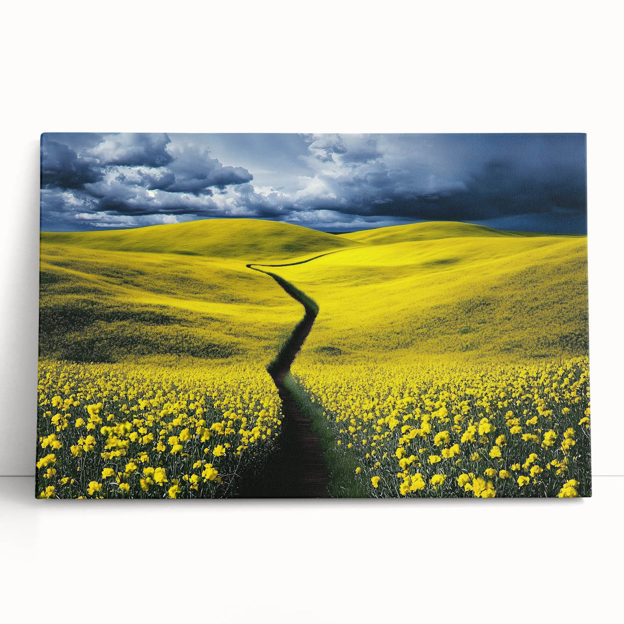 Stretched canvas artwork depicting a serene landscape with vibrant green fields and a clear blue sky, leaning against a wall, perfect for home decor.