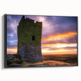 Framed canvas artwork showcasing a stunning landscape with a castle, featuring a sleek black frame. Ideal for home decor, it enhances any room's aesthetic appeal.