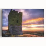 A vibrant stretched canvas depicting a picturesque landscape with a majestic castle nestled among lush green hills and a clear blue sky, ideal for home decor.