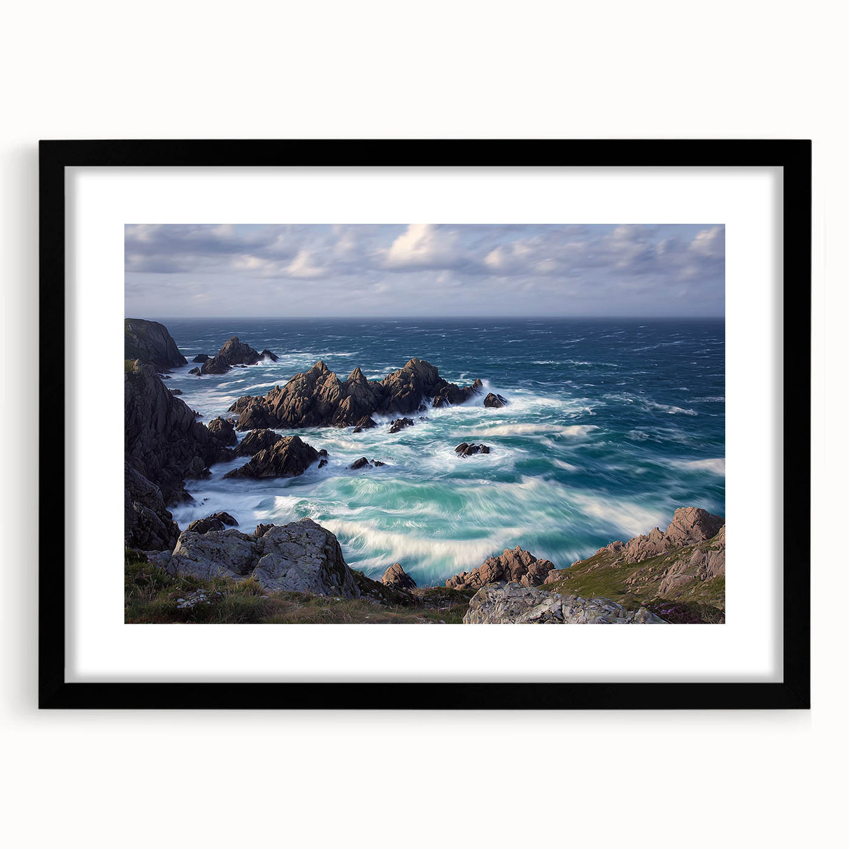 Framed landscape artwork showcasing dramatic cliffs in a serene natural setting, featuring a sleek black mat and frame, ideal for modern home decor.