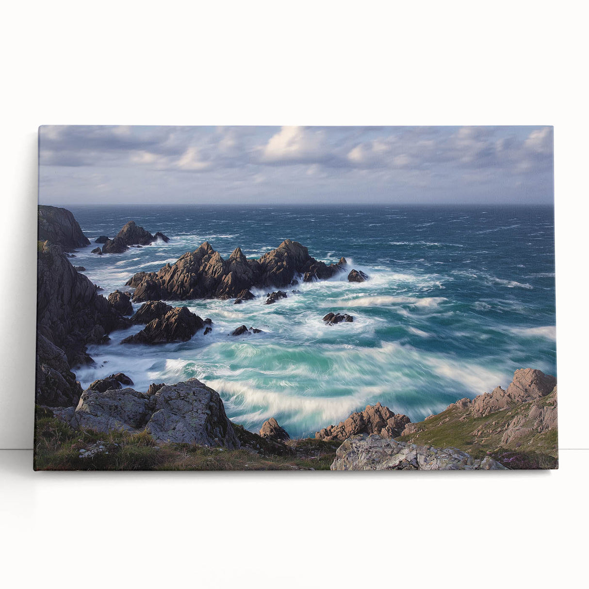 Stretched canvas artwork depicting a dramatic cliff landscape at sunset, showcasing vibrant oranges and purples, ideal for modern home decor.