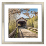 Textured art print of a covered bridge in muted earth tones, framed in silver, suitable for bedroom decor.