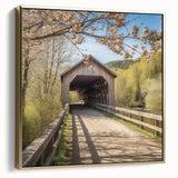Framed canvas depicting a vintage-style landscape with a covered bridge in muted silver and gold tones.