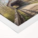 Art Deco poster featuring an architecture-covered bridge in muted brown tones on rolled canvas.