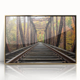 Framed acrylic artwork depicting a serene landscape bridge scene with gold accents, ideal for home decor to enhance elegance and tranquility in living spaces.