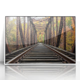 Framed acrylic artwork depicting a serene landscape bridge scene with vibrant colors, set in a sleek white frame, ideal for home decor and art enthusiasts.