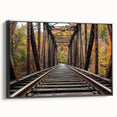 Framed canvas artwork showcasing a serene landscape of a bridge with lush greenery, featuring a black frame. Ideal for home decor, emphasizing tranquility and nature.