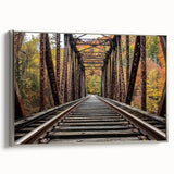 Framed canvas artwork displaying a scenic landscape of a bridge, highlighted with silver accents and a sleek side view, ideal for modern home decor.