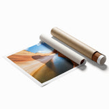 Vibrant landscape print showcasing majestic canyons in rich earthy tones, rolled and securely packaged in a cardboard tube, ideal for home decor enthusiasts.