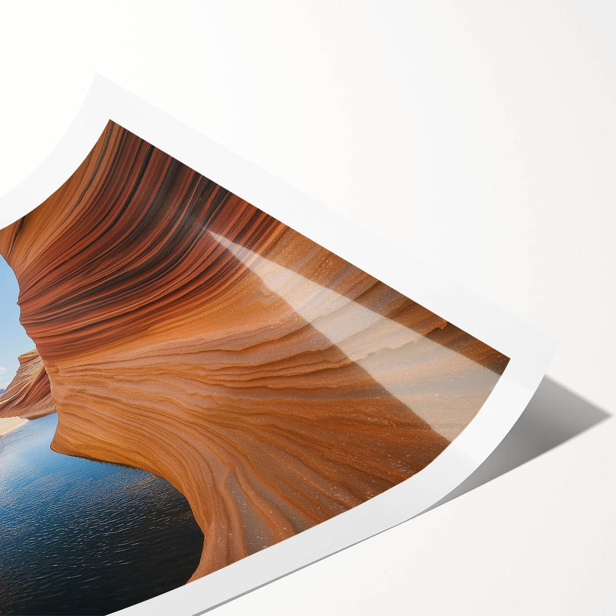 Stunning landscape print showcasing vibrant canyons under a bright blue sky, rolled neatly for easy display. Perfect for home decor enthusiasts seeking natural beauty.