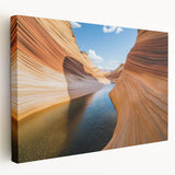 Stretched canvas artwork depicting a vibrant landscape of canyons in warm earthy tones, showcasing dramatic rock formations and expansive skies, perfect for home decor.