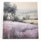 Stretched canvas wall art depicting a serene countryside landscape with rolling hills, vibrant green fields, and a clear blue sky, perfect for home decor.