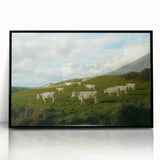 Framed acrylic landscape artwork depicting a serene countryside scene, featuring vibrant green fields and a clear blue sky, presented in a sleek black frame.