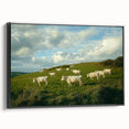 Framed canvas artwork showcasing a serene countryside landscape with lush green fields and a vibrant blue sky, highlighted by a sleek black frame from a side view.